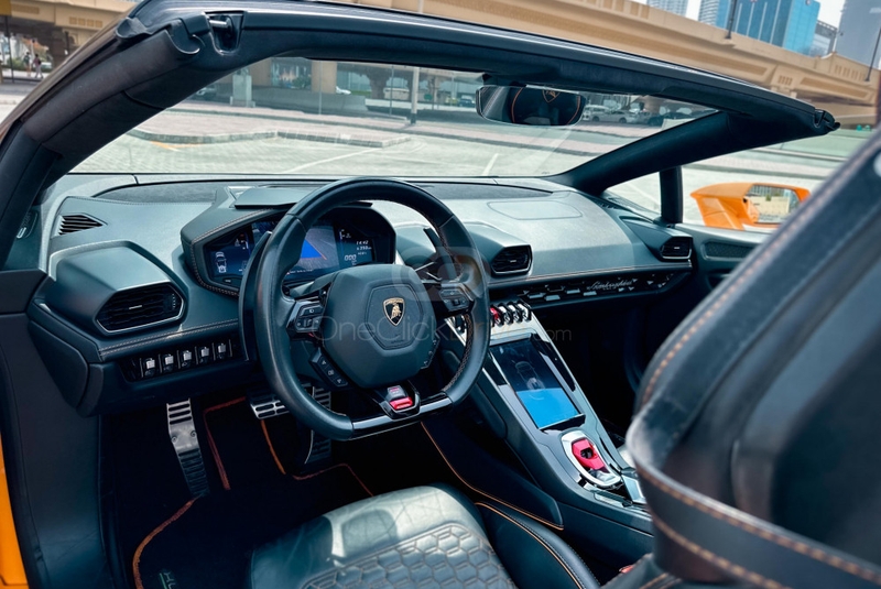 Orange Lamborghini Huracan Evo Spyder 2022
