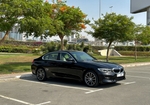 Black BMW 330i 2021