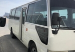 Белый Тойота 30-местный автобус Coaster 2014