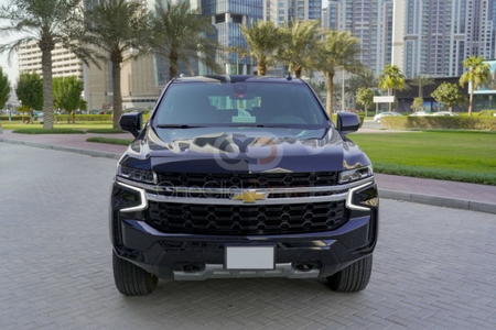 Chevrolet Suburban 2023 with Driver