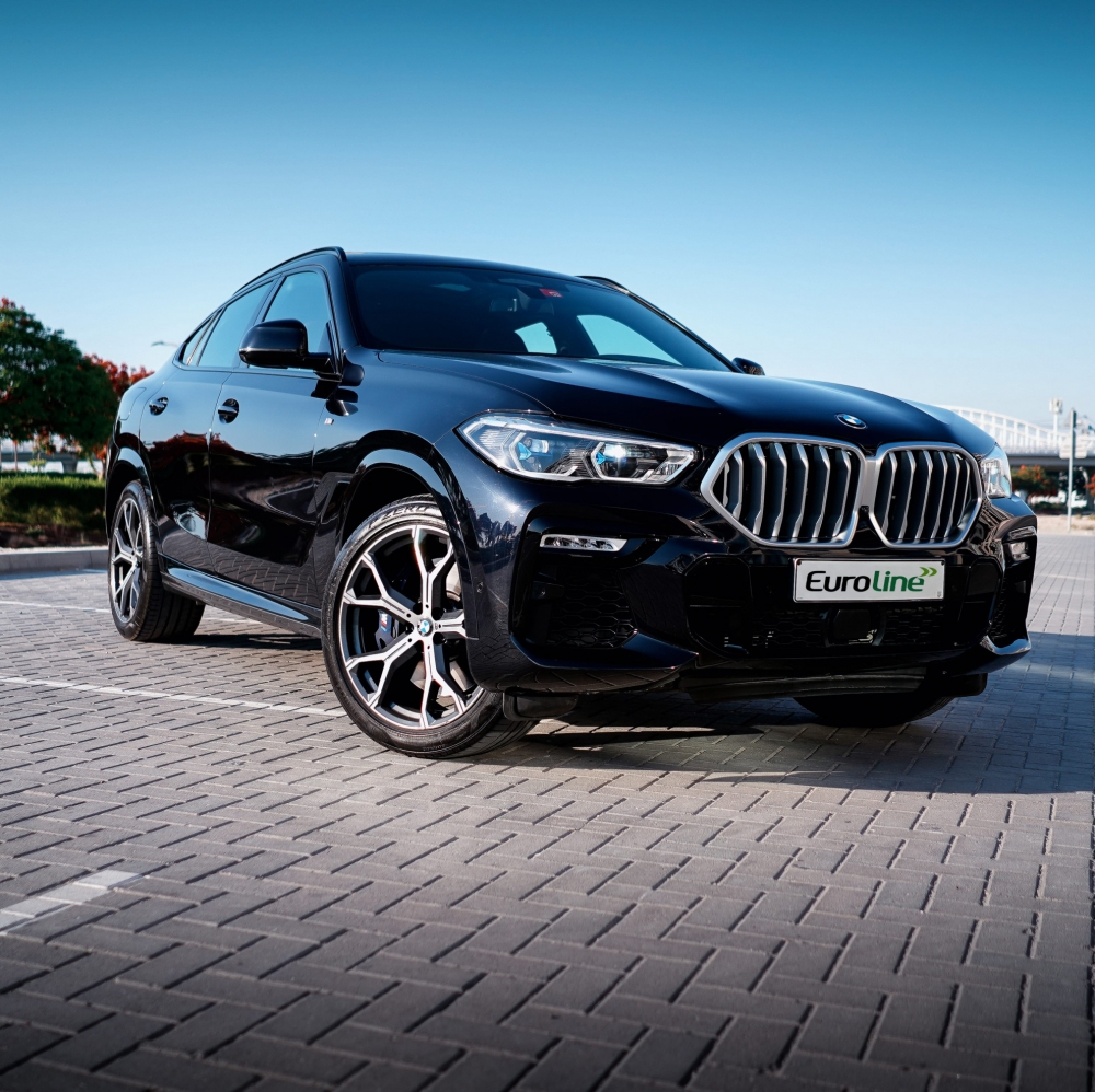 Черный BMW Х6 xDrive40i 2022 год