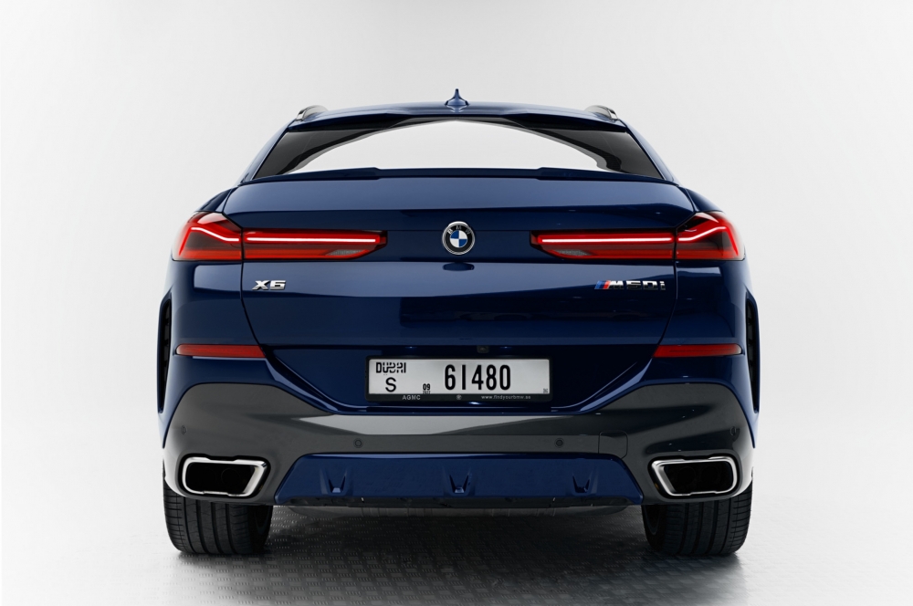 Blue BMW X6 M50i 2022