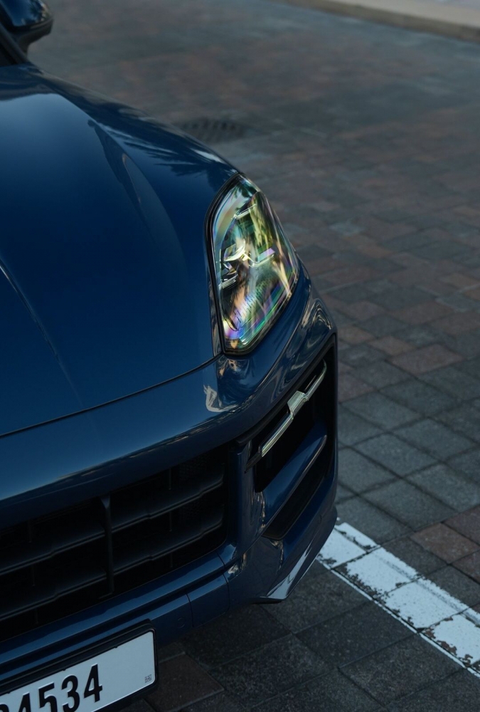 Blue Porsche Cayenne Coupe 2024