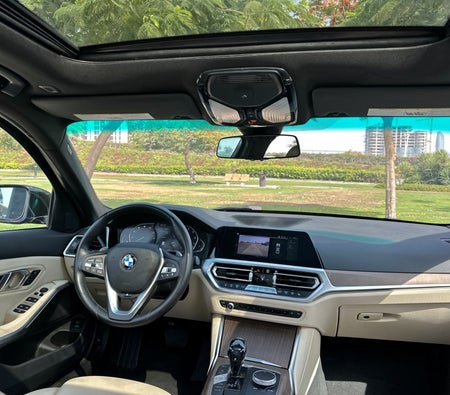 Rent BMW 330i 2021 in Abu Dhabi