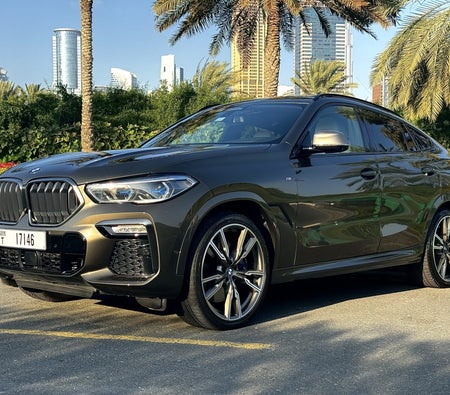 Rent BMW X6 M50i 2020 in Dubai