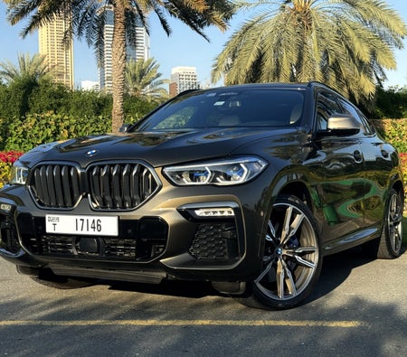 Rent BMW X6 M50i 2020 in Dubai