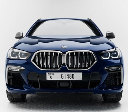 Rent BMW X6 M50i 2022 in Dubai