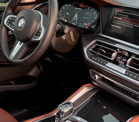 Rent BMW X6 M50i 2023 in Dubai