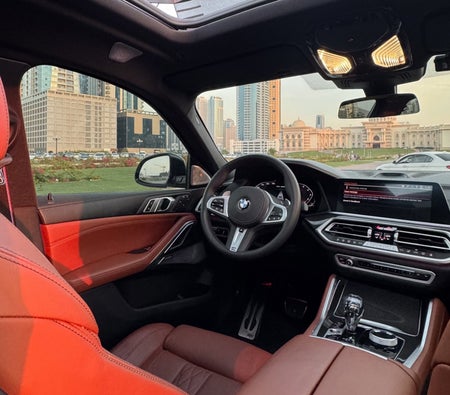 Rent BMW X6 M50i 2023 in Dubai