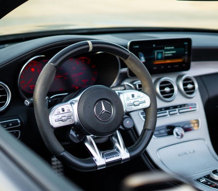Rent Mercedes Benz AMG C63 Convertible 2020 in Dubai