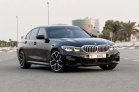 Black BMW 330i 2021 for rent in Dubai 1