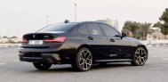Black BMW 330i 2021 for rent in Dubai 6