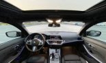 Black BMW 330i 2021 for rent in Dubai 3