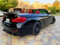 zwart BMW 430i Cabrio M-Kit 2018 for rent in Dubai 7