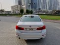 White BMW 520i 2020 for rent in Abu Dhabi 5