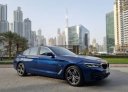 Blue BMW 520i 2023 for rent in Dubai 1