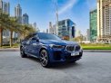 Blue BMW X6 M40 2022 for rent in Abu Dhabi 7