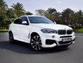 White BMW X6 M50i 2018 for rent in Dubai 1