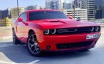 Red Dodge Challenger V6 2018 for rent in Dubai 1