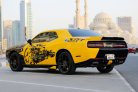Yellow Dodge Challenger V6 2018 for rent in Dubai 7