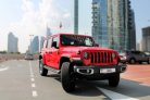 rood Jeep Wrangler Unlimited Sahara-editie 2019 for rent in Dubai 1