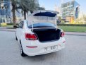 White Kia Pegas 2022 for rent in Abu Dhabi 9