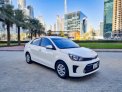 White Kia Pegas 2022 for rent in Abu Dhabi 1