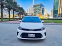 White Kia Pegas 2022 for rent in Abu Dhabi 3