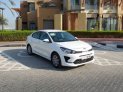 White Kia Rio Sedan 2021 for rent in Dubai 2