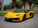 Yellow Lamborghini Aventador SVJ Roadster 2022 in Dubai 7
