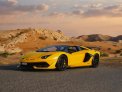 Yellow Lamborghini Aventador SVJ Roadster 2022 for rent in Abu Dhabi 7
