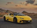 Yellow Lamborghini Huracan Evo Spyder 2021 for rent in Abu Dhabi 1