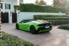 Yeşil Lamborghini Huracan Evo Spyder 2022 for rent in Dubai 8