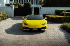 Sarı Lamborghini Huracan Evo Spyder 2022 for rent in Dubai 2