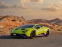 Light Green Lamborghini Huracan STO 2022 for rent in Abu Dhabi 7