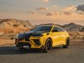 Yellow Lamborghini Urus Mansory 2021 for rent in Abu Dhabi 2