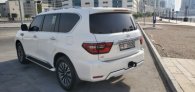 White Nissan Patrol Platinum 2021 for rent in Abu Dhabi 2