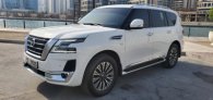 White Nissan Patrol Platinum 2021 for rent in Abu Dhabi 1
