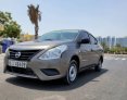 Brown Nissan Sunny 2017 for rent in Ajman 1