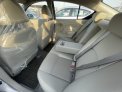 Silver Nissan Sunny 2023 for rent in Dubai 9