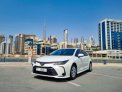 White Toyota Corolla 2021 for rent in Sharjah 1