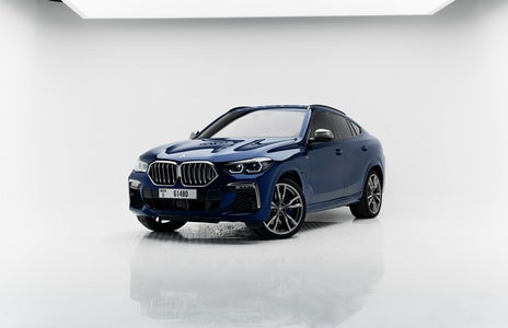 Rent BMW X6 M50i 2022 in Dubai