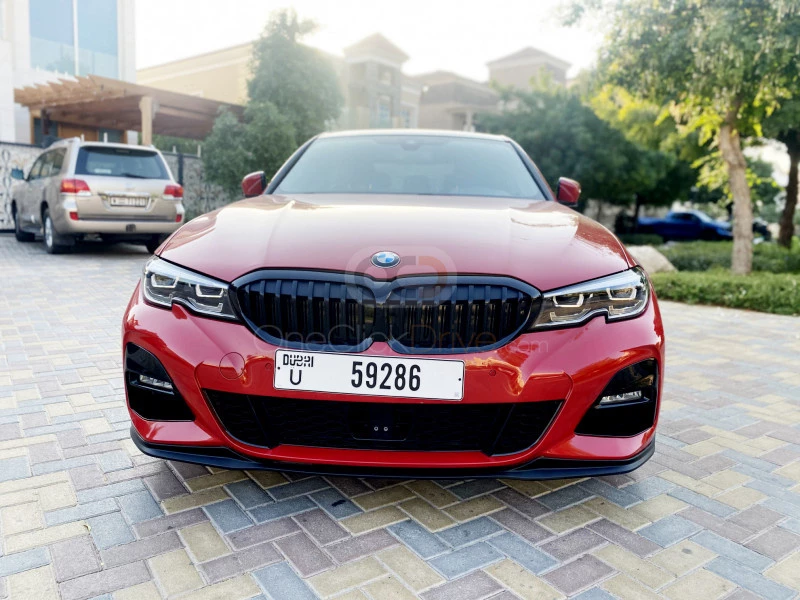rood BMW 330i 2020 for rent in Dubai 4