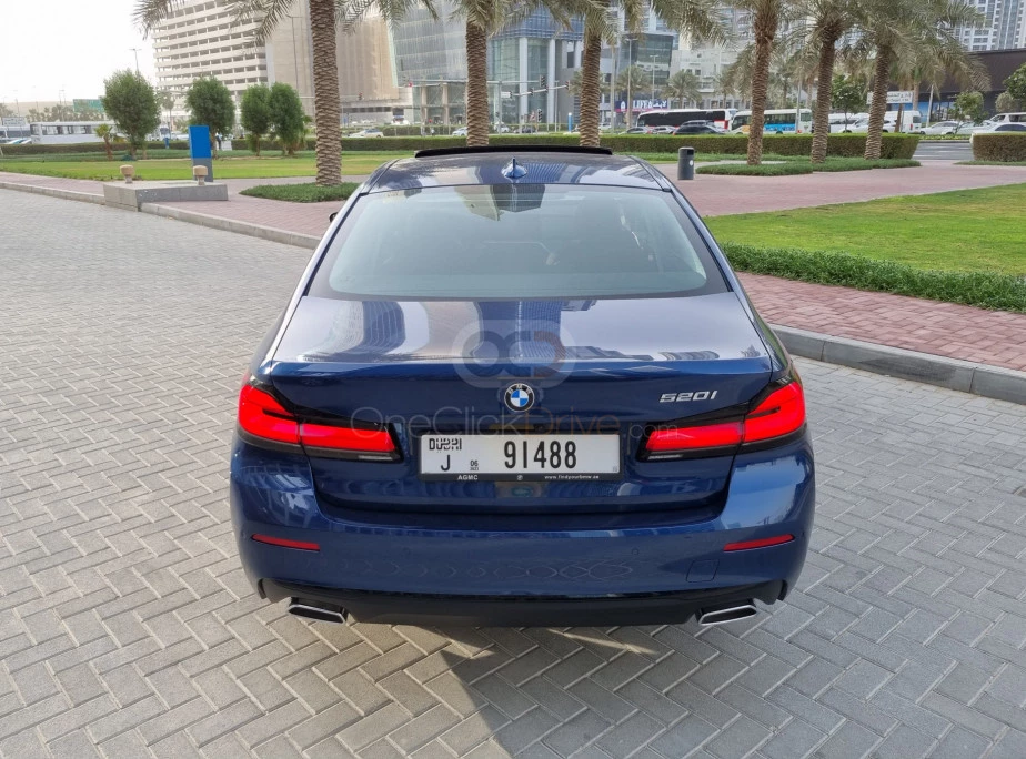 Blue BMW 520i 2023 for rent in Dubai 5