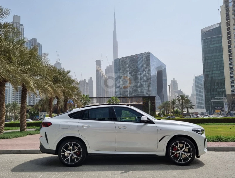 White BMW X6 M40 2023 for rent in Dubai 3