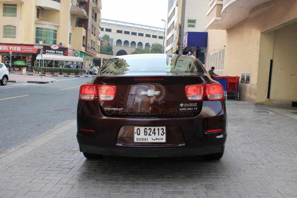 Maroon Chevrolet Malibu 2015 for rent in Dubai 4