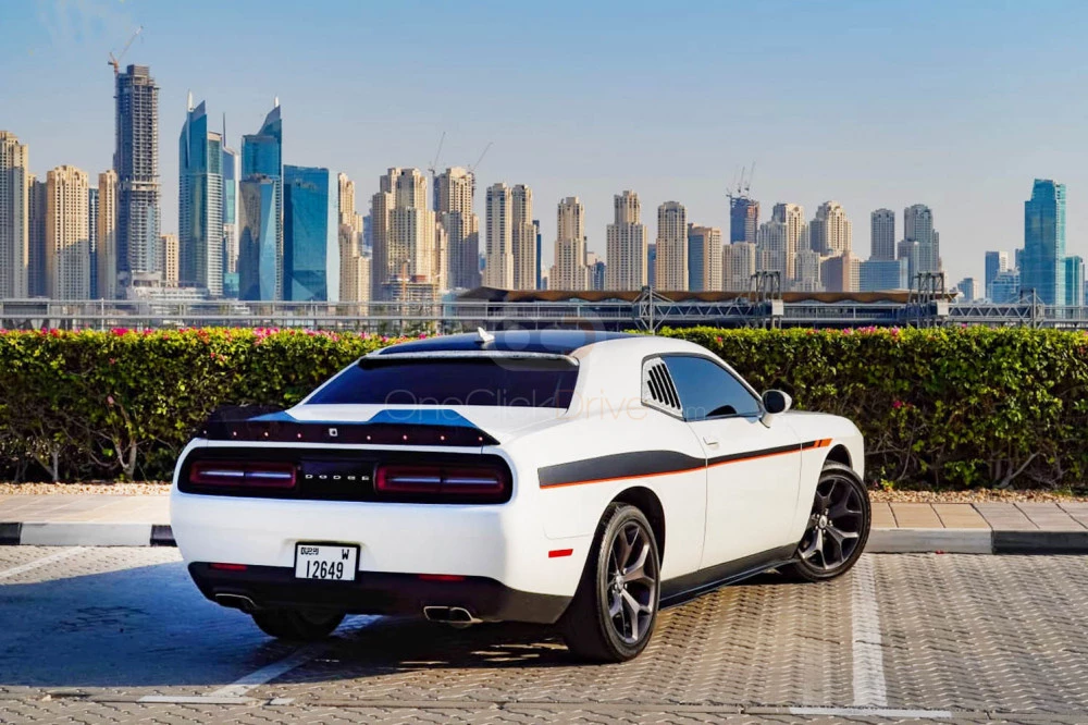 White Dodge Challenger V6 2019 for rent in Ras Al Khaimah 3