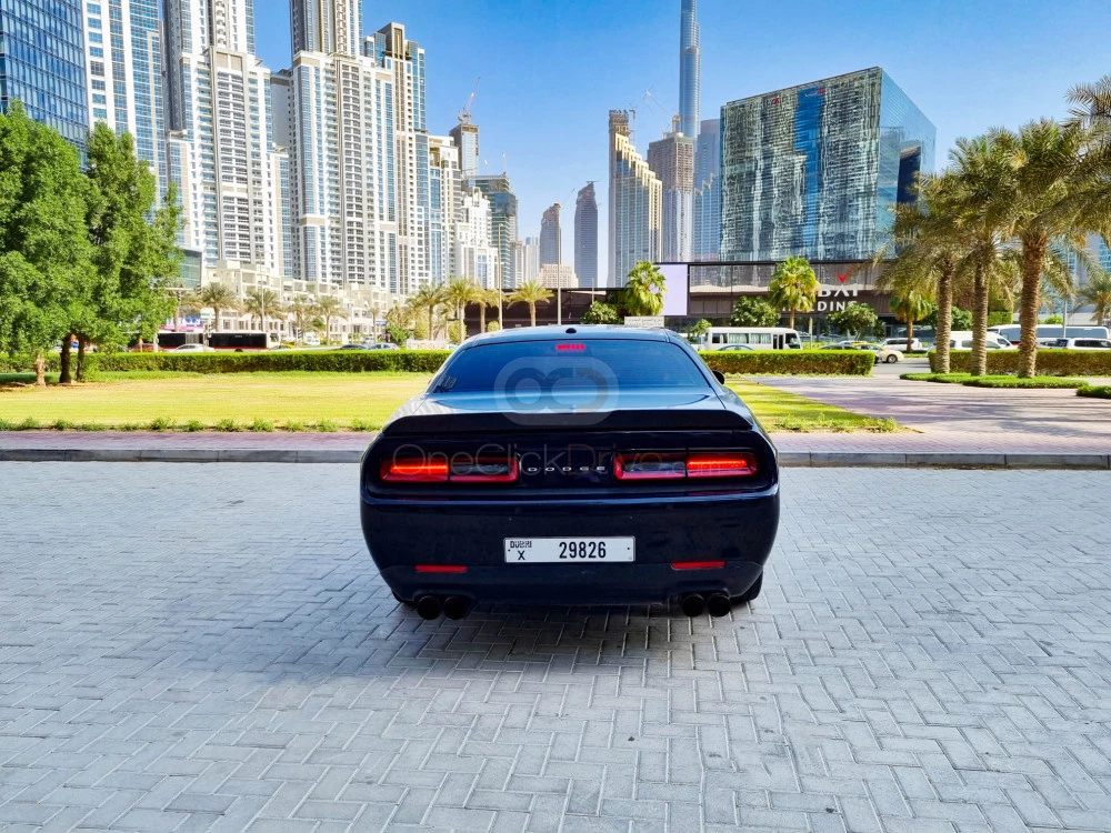 Black Dodge Challenger V6 2019 for rent in Dubai 9