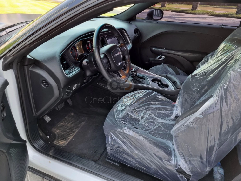 Black Dodge Challenger V6 2019 for rent in Dubai 4