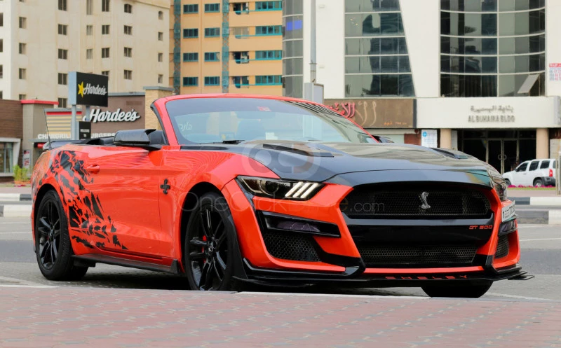Yellow Ford Mustang EcoBoost Convertible V4 2016 for rent in Ajman 1